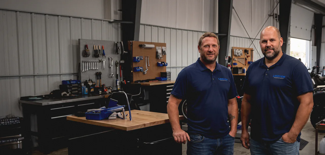 George and Marko standing together in the Lakeview Power Sports workshop