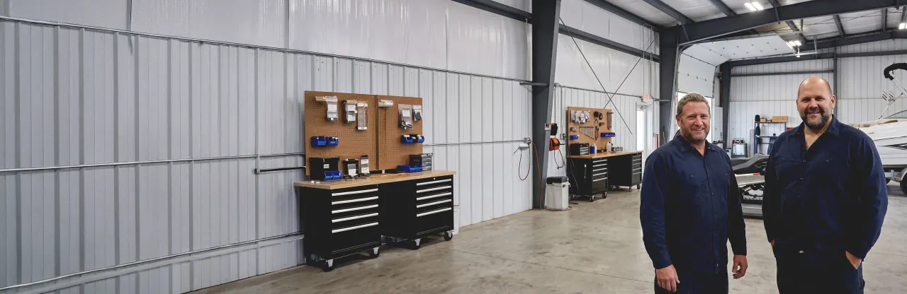 George and Marko in the Lakeview Power Sports workshop